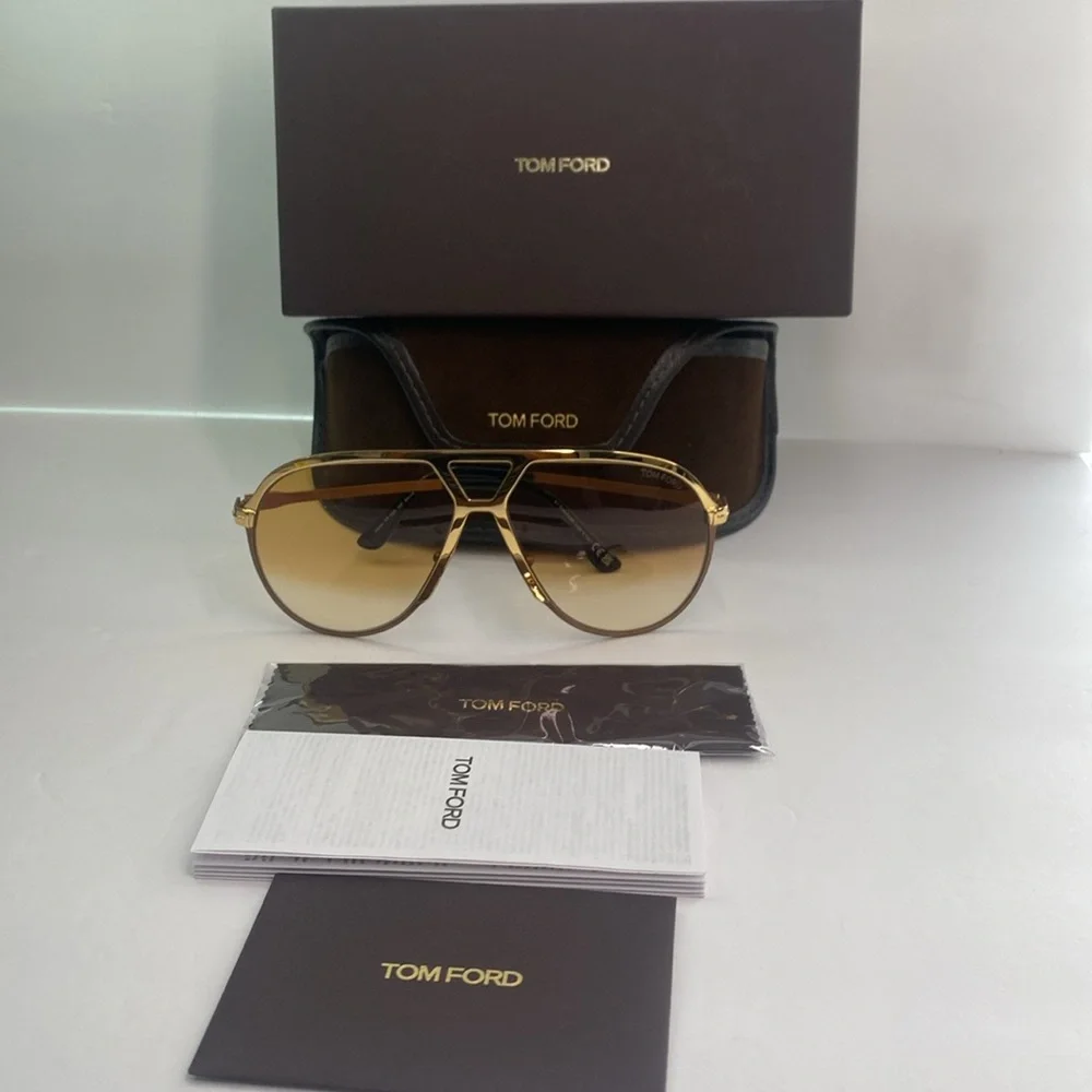 TOM FORD Xavier FT1060/S 30F aviator sunglass gold frame brown gradient lenses.